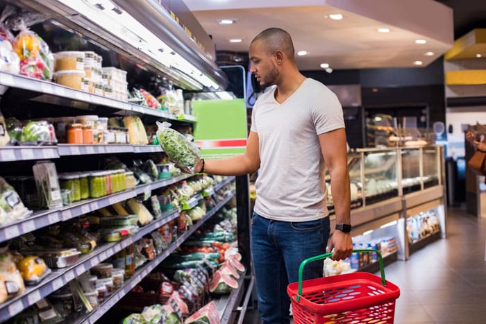 Man in White T-shirt Shopping